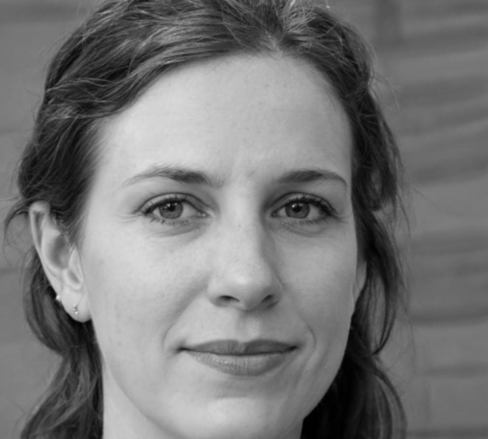 Instructor Astrid Lindgren reviewing student project work